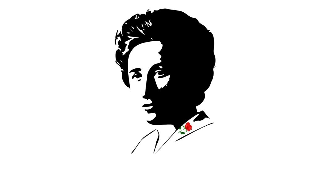 Rosa Luxemburgo, apodada «La rosa roja», nació el 5 de marzo de 1871 en Zamość, Polonia, y murió el 15 de enero de 1919 en Berlín, Alemania. Diseño realizado con dos imágenes de Free SVG (silueta de Rosa Luxemburgo y rosa roja), bajo licencia CC0). Rosa Luxemburgo, apodada «La rosa roja», nació el 5 de marzo de 1871 en Zamość, Polonia, y murió el 15 de enero de 1919 en Berlín, Alemania. Diseño realizado con dos imágenes de Free SVG (silueta de Rosa Luxemburgo y rosa roja), bajo licencia CC0).